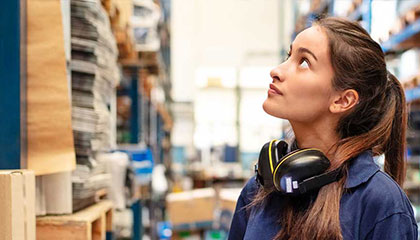 Woman working in storeroom