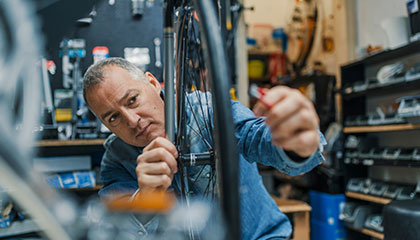 Man working on bicycle