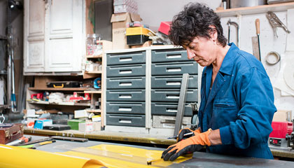Woman Cutting fabric