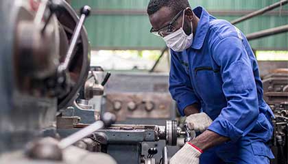 Man working with heavy machinery